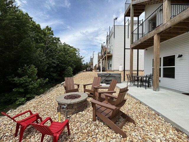 view of patio featuring a fire pit