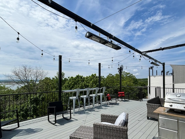 wooden terrace with grilling area