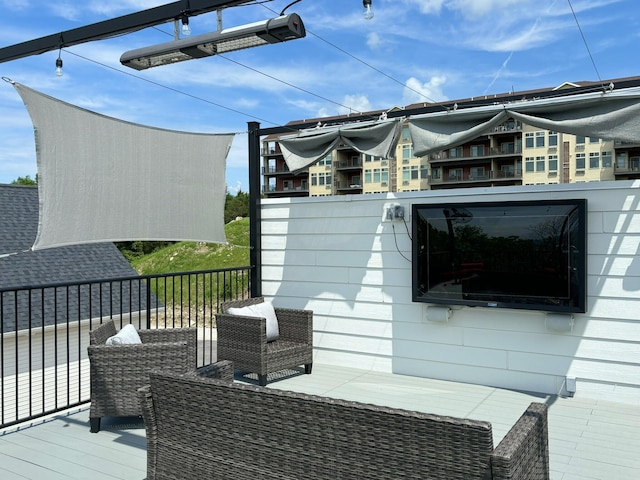 view of home's exterior with a balcony