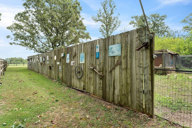 view of yard with fence