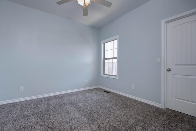 empty room featuring visible vents, ceiling fan, baseboards, and carpet