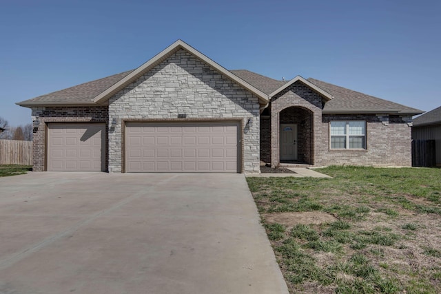 view of front of house featuring a garage, brick siding, roof with shingles, and concrete driveway