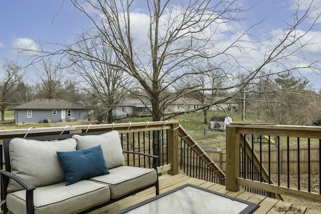 wooden deck featuring an outdoor hangout area