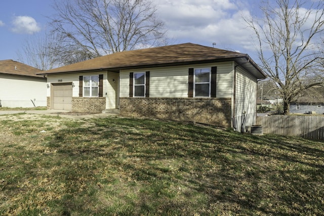 ranch-style home featuring brick siding, an attached garage, a front yard, and fence