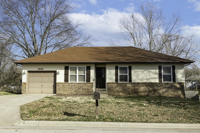 view of front of home featuring brick siding, an attached garage, concrete driveway, and a front lawn