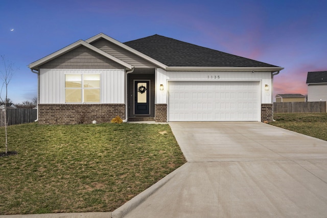 ranch-style house featuring brick siding, a garage, and fence