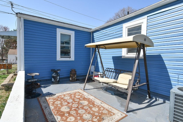 view of patio / terrace featuring cooling unit