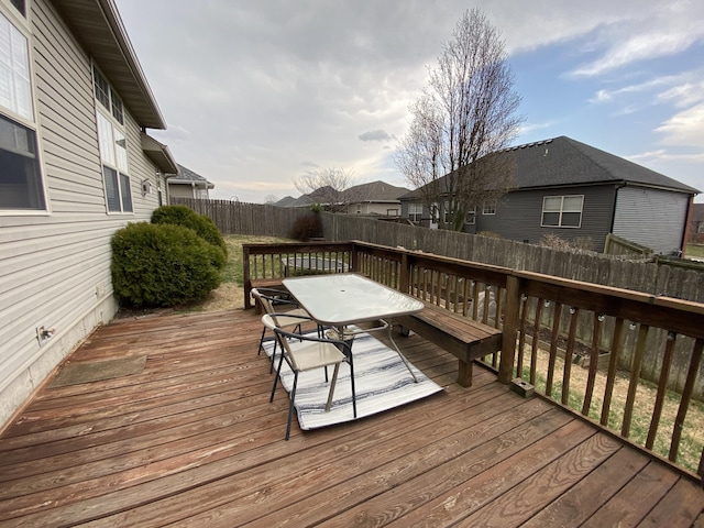 wooden deck featuring fence