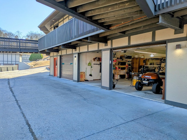 garage featuring driveway