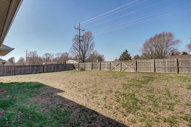 view of yard featuring a fenced backyard