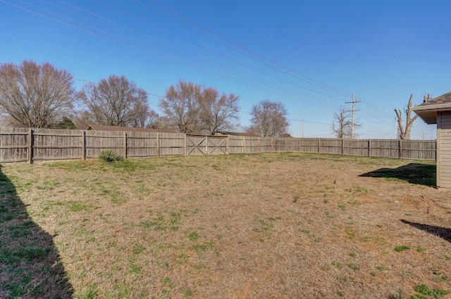 view of yard featuring a fenced backyard