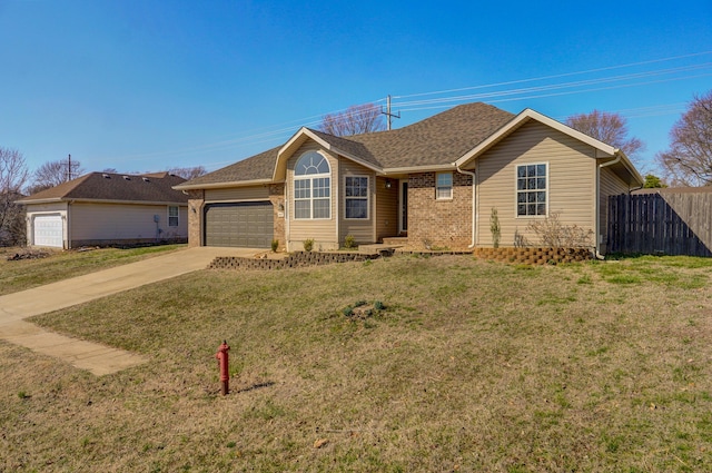 ranch-style house with driveway, a front lawn, fence, an attached garage, and brick siding