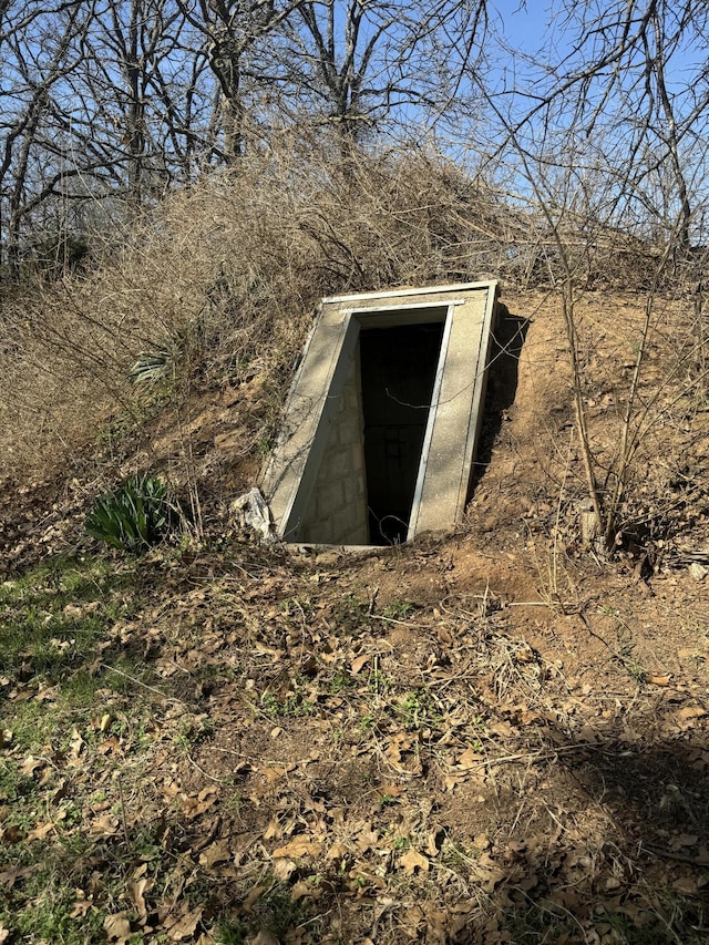 view of entry to storm shelter