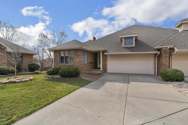 view of front facade with brick siding, an attached garage, concrete driveway, and a front lawn