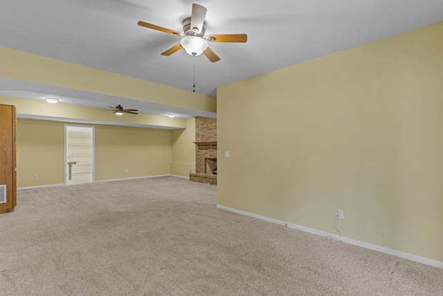 interior space featuring baseboards, carpet, and ceiling fan