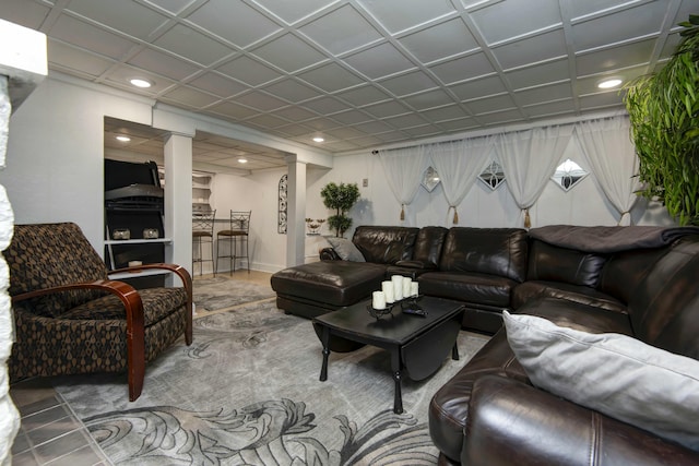 living room with recessed lighting and decorative columns