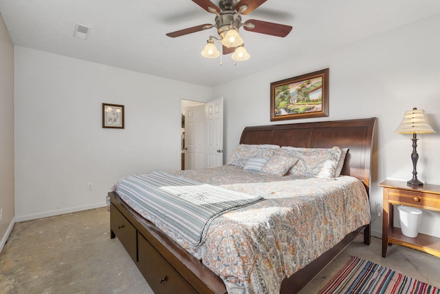 bedroom featuring a ceiling fan, baseboards, and concrete flooring