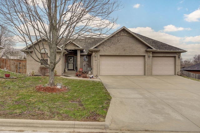 ranch-style house with a garage, brick siding, concrete driveway, and fence