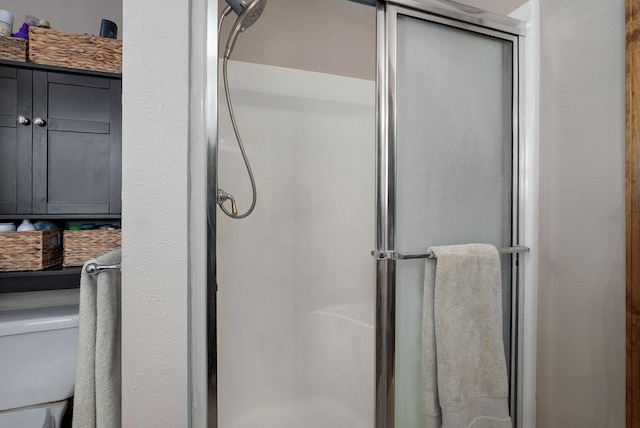 bathroom featuring a stall shower