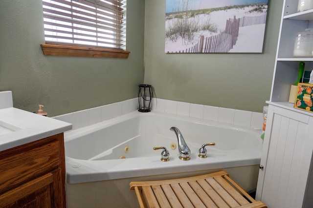 full bath featuring a tub with jets