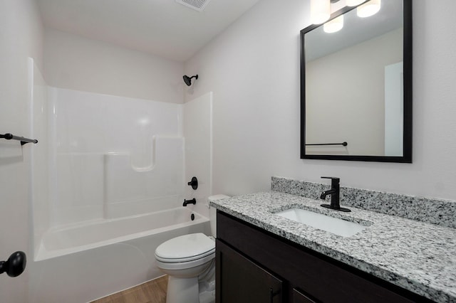 full bath featuring shower / washtub combination, toilet, vanity, and wood finished floors