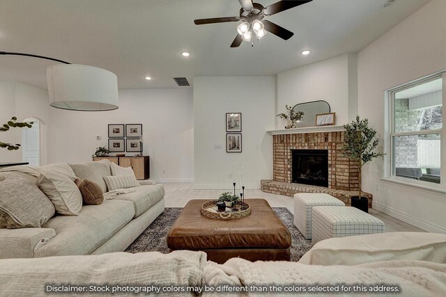 5202 S April Ct, Battlefield, MO 65619 - living room featuring recessed lighting, visible vents, a brick fireplace, and ceiling fan