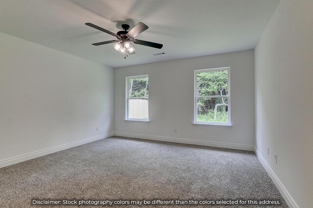 5202 S April Ct, Battlefield, MO 65619 - carpeted spare room with visible vents, ceiling fan, and baseboards
