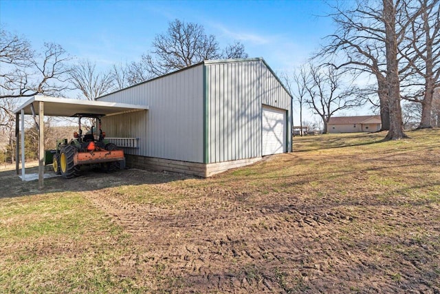 view of outbuilding with an outbuilding and a carport