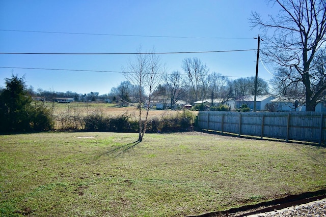 view of yard with fence