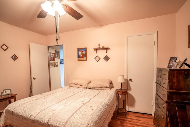 2457 County Road 1770, West Plains, MO 65775 - bedroom with a ceiling fan and wood finished floors