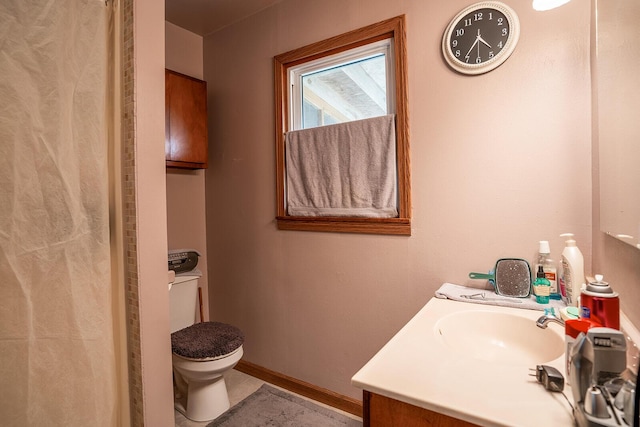 2457 County Road 1770, West Plains, MO 65775 - full bath featuring vanity, toilet, and baseboards