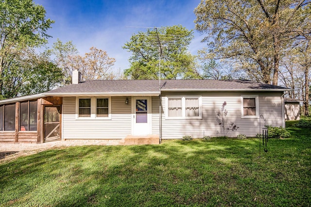 2457 County Road 1770, West Plains, MO 65775 - single story home featuring roof with shingles, a chimney, a front yard, and a sunroom