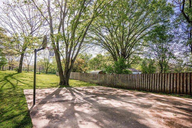 2457 County Road 1770, West Plains, MO 65775 - view of patio / terrace featuring fence and basketball hoop