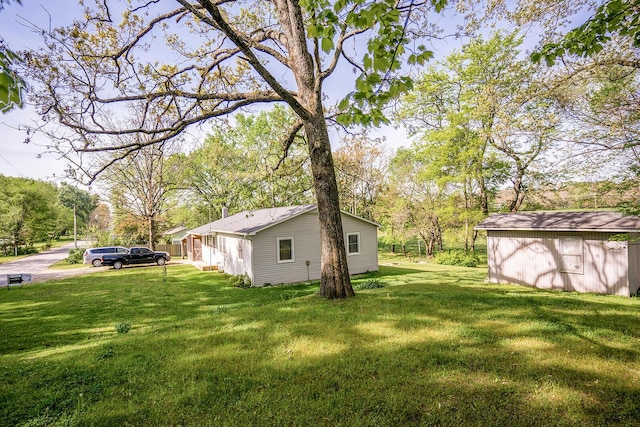 2457 County Road 1770, West Plains, MO 65775 - view of yard with an outdoor structure and a storage shed