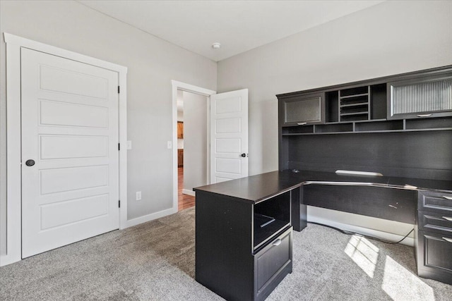 carpeted office with baseboards