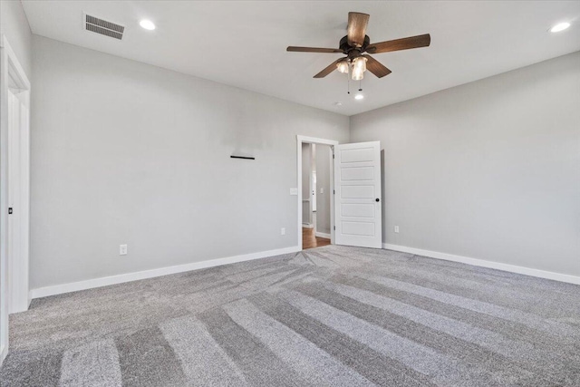 carpeted empty room with recessed lighting, baseboards, visible vents, and ceiling fan