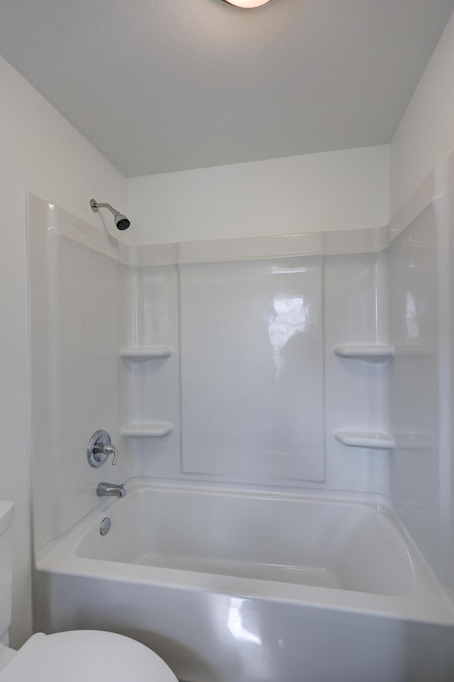 full bath with toilet and shower / bath combination