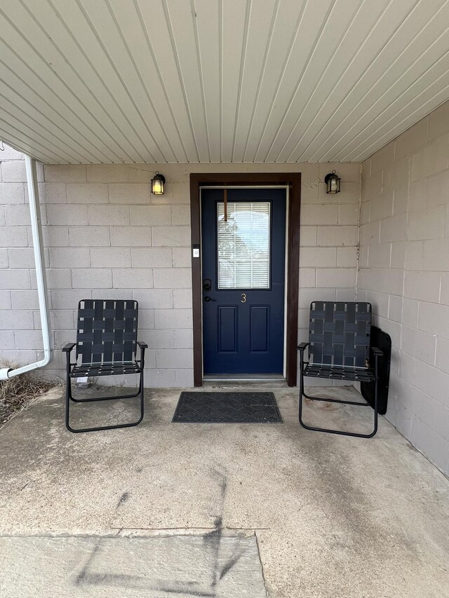 610 N Center St, Willow Springs, MO 65793 - view of exterior entry with concrete block siding