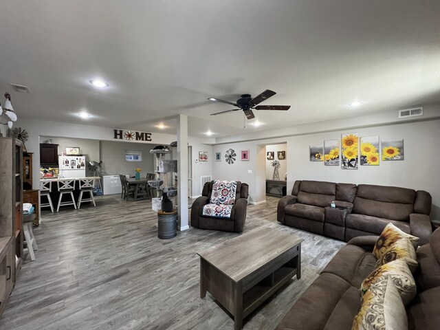 610 N Center St, Willow Springs, MO 65793 - living room with ceiling fan, visible vents, wood finished floors, and recessed lighting