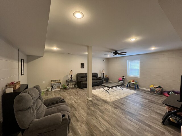 610 N Center St, Willow Springs, MO 65793 - living area featuring concrete block wall, wood finished floors, recessed lighting, and ceiling fan