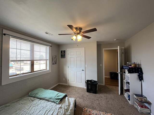 610 N Center St, Willow Springs, MO 65793 - bedroom featuring carpet flooring, a ceiling fan, visible vents, and baseboards