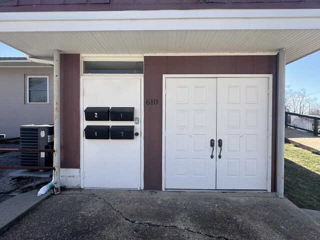 610 N Center St, Willow Springs, MO 65793 - garage with central AC unit