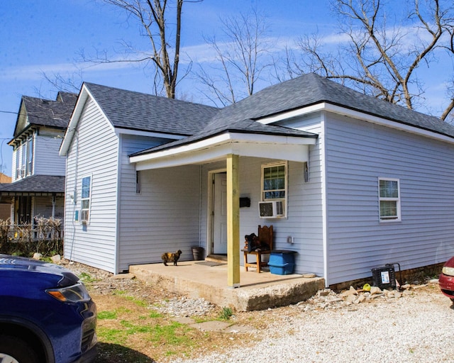 view of front of home featuring a shingled roof