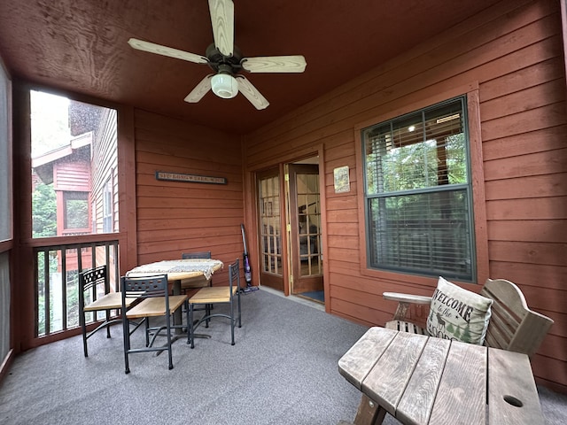 215 Oakridge Rd, Branson, MO 65616 - sunroom with a ceiling fan, outdoor dining area, and healthy amount of natural light