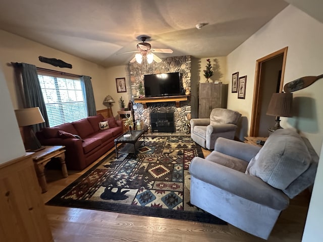 215 Oakridge Rd, Branson, MO 65616 - living area featuring ceiling fan, a fireplace, and wood finished floors