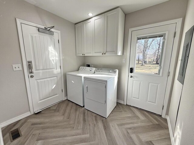 3100 E 354th Rd, El Dorado Springs, MO 64744 - laundry area featuring cabinet space, separate washer and dryer, and baseboards