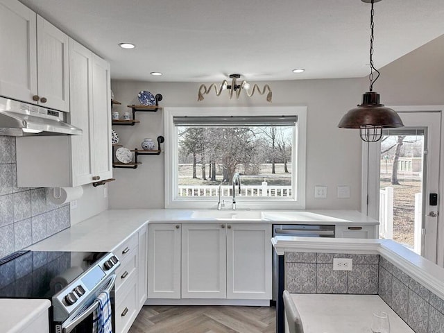 3100 E 354th Rd, El Dorado Springs, MO 64744 - kitchen featuring stainless steel electric range oven, under cabinet range hood, healthy amount of natural light, a sink, and recessed lighting