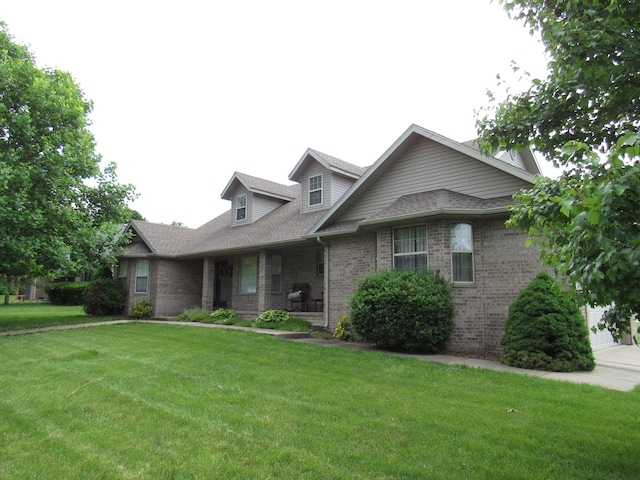 640 S Shuyler St, Republic, MO 65738 - view of front of home with brick siding, a front lawn, and roof with shingles
