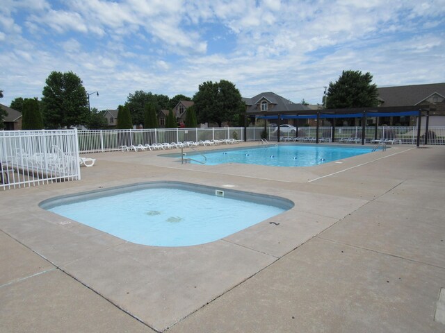 640 S Shuyler St, Republic, MO 65738 - community pool with a patio area