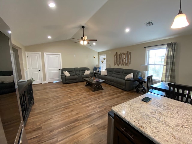 2520 S Schifferdecker Ave, Joplin, MO 64804 - living room with visible vents, dark wood finished floors, recessed lighting, lofted ceiling, and ceiling fan